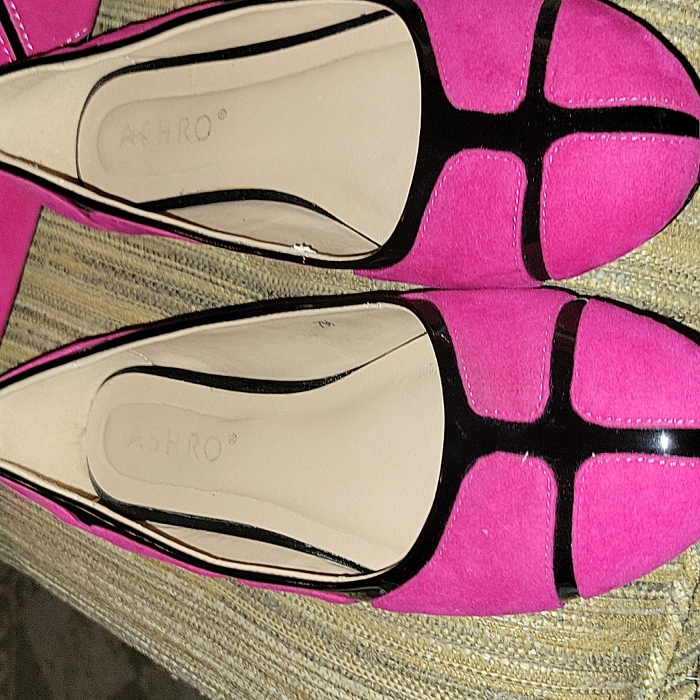 Pink and black shoes.